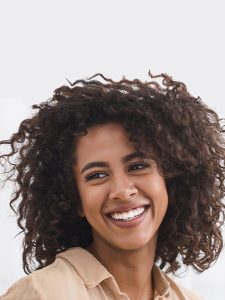 Woman Smiling After Vaginal Rejuvenation Surgery in NYC, Manhattan, Brooklyn, and Manhasset